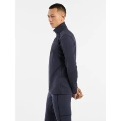 Arc'teryx Rho LT Zip Neck - Men's -Western Mountaineering shop Rho LT Zip Neck Black Sapphire Side View Left rsz 51976.1674262084